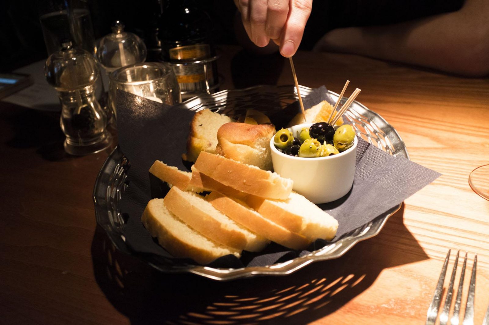 olives and bread in cucina rustica