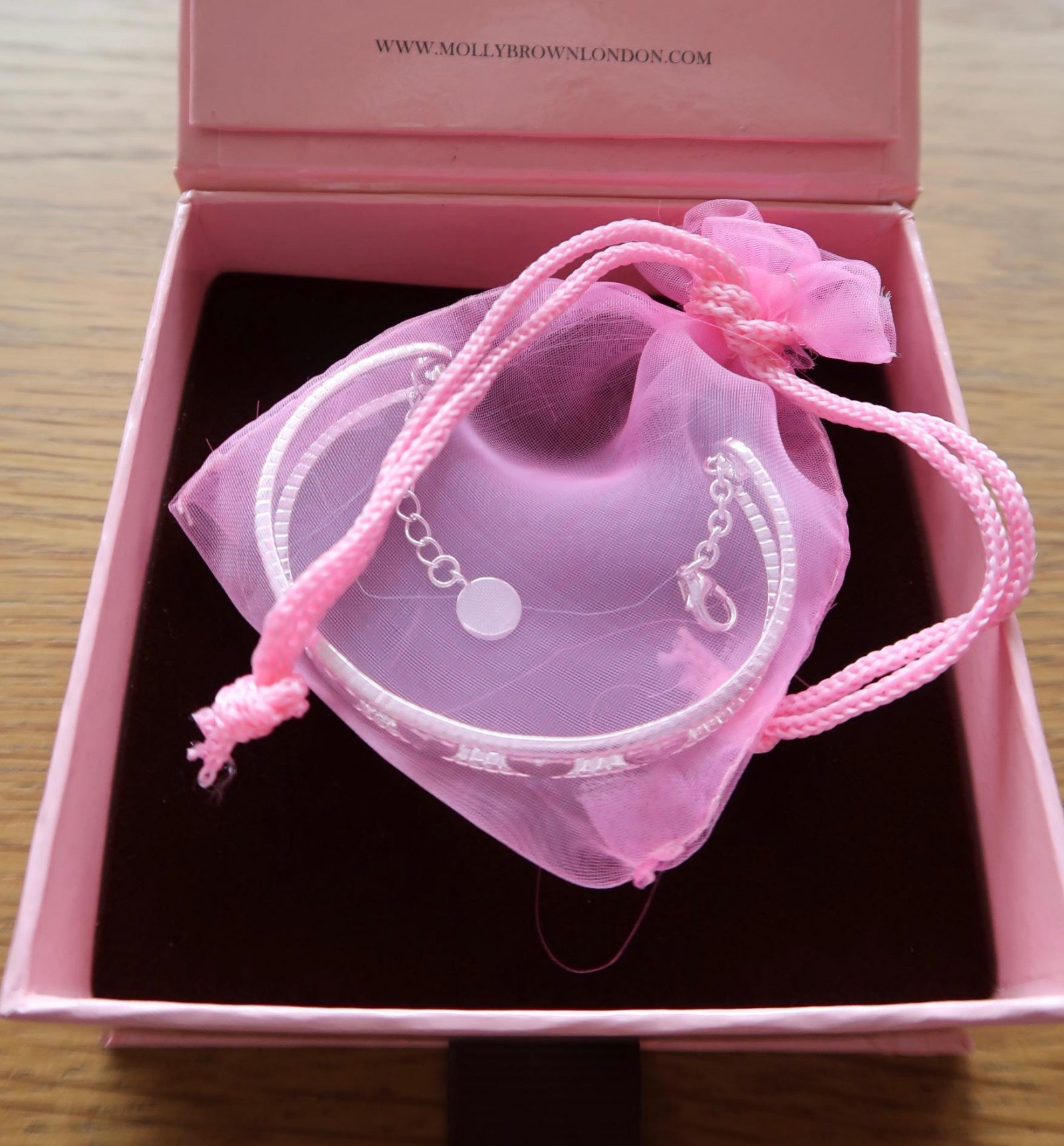 Molly Brown Her love bangle in pink bag and box