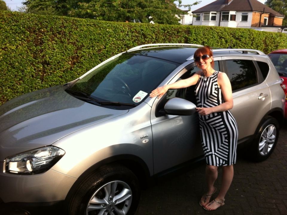 Girl with a new grey Nissan Qashqai