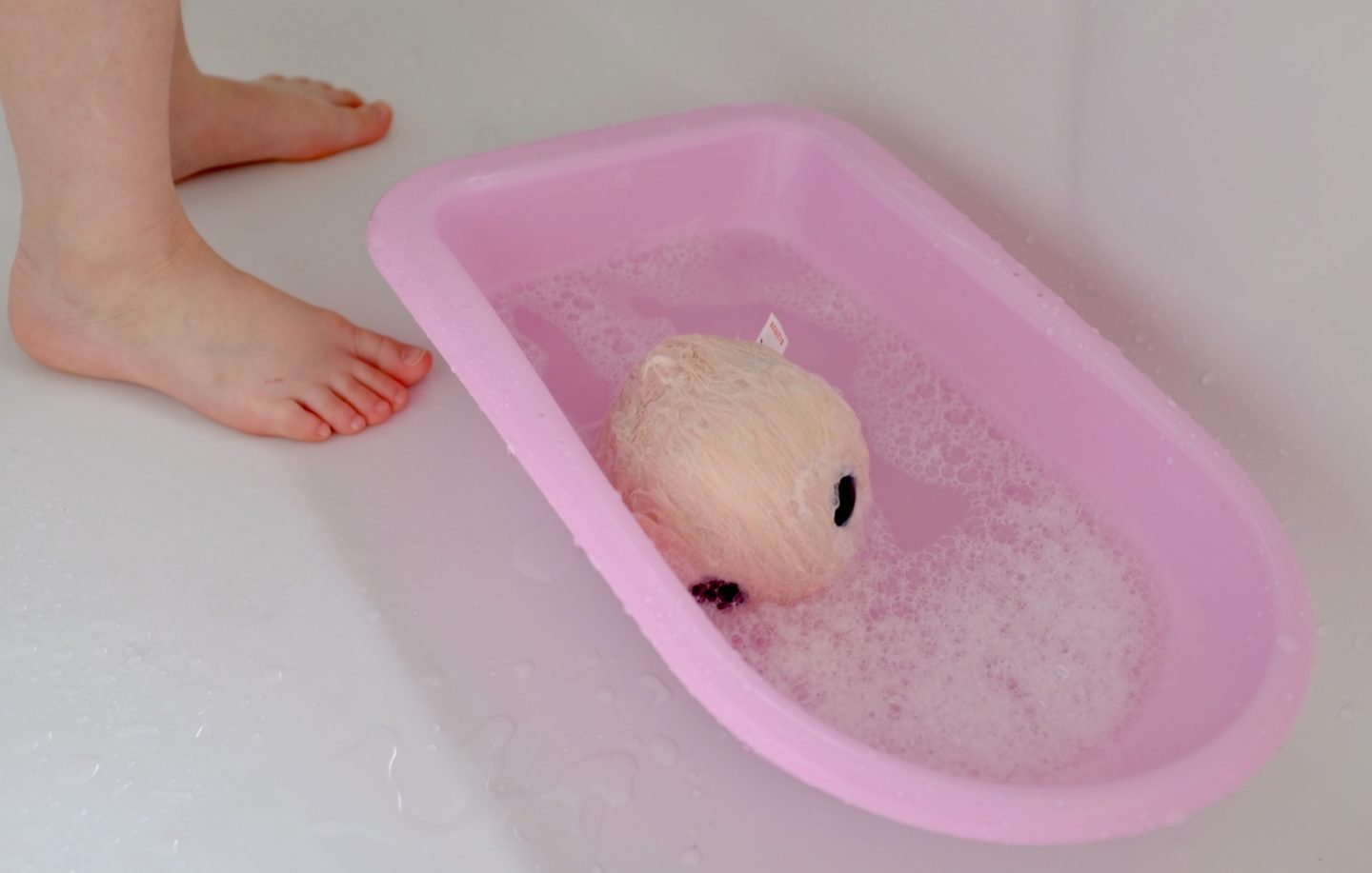 Blossom Bunnies Scruff-a-Luvs ready to be washed in a bath