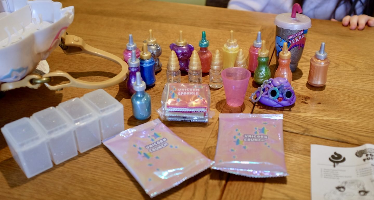 Contents in the Poopsie Pooey Puitton