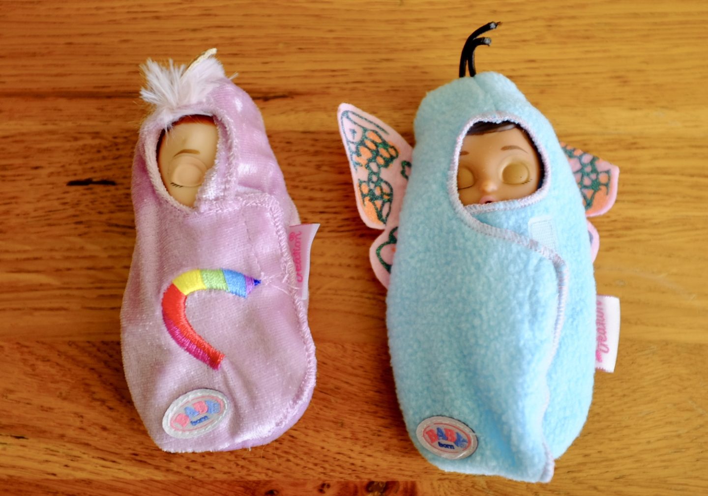two swaddled babys