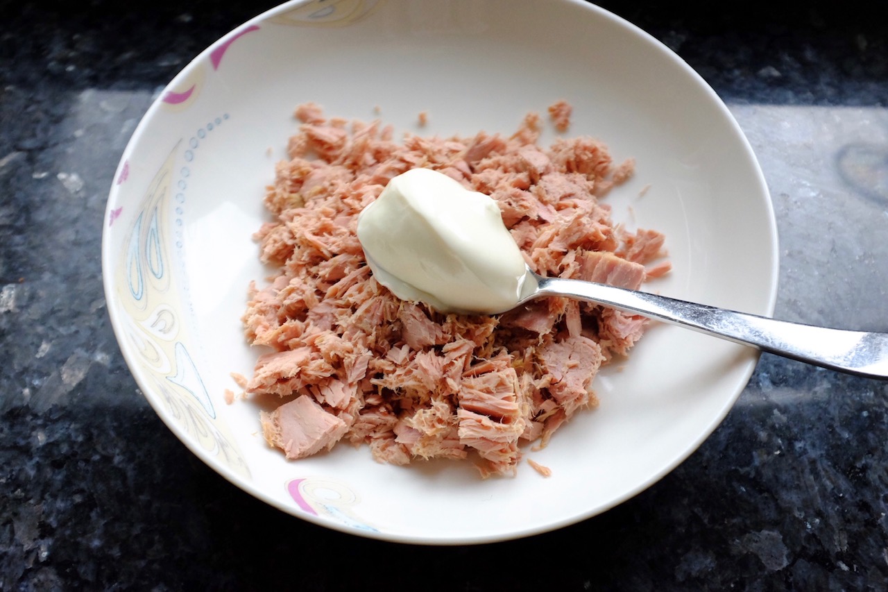 tuna with a spoon of mayonnaise