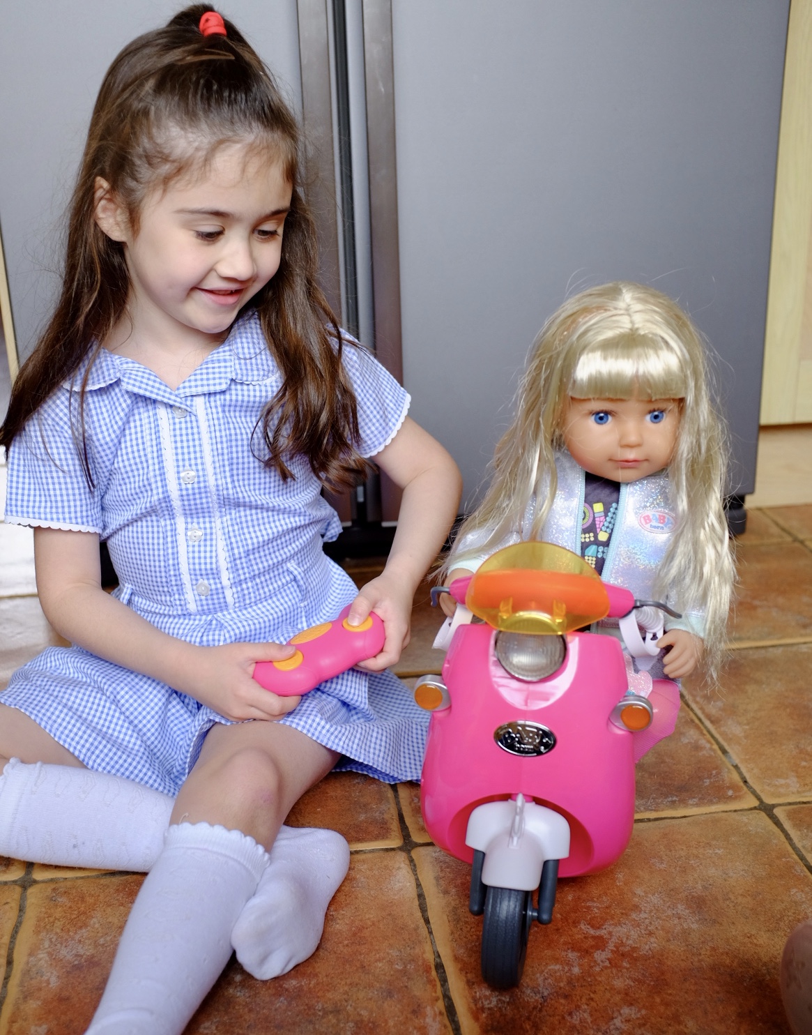 Girl with BABY born Scooter and sister doll