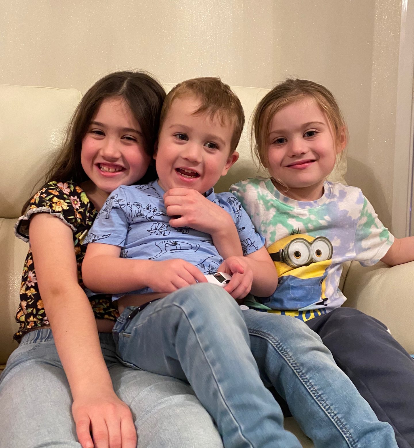 three siblings - two girls and a boy