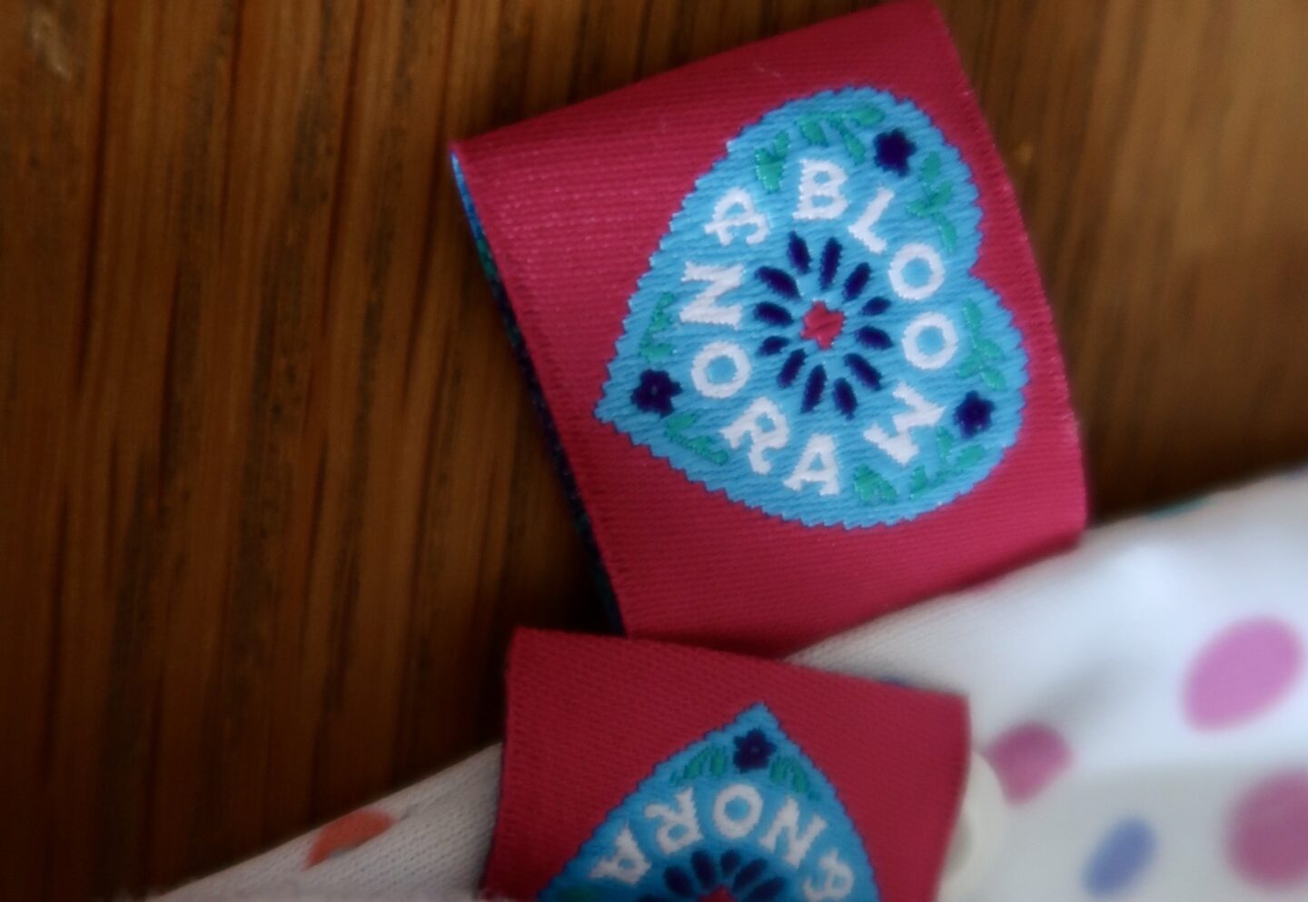 bloom and Nora label